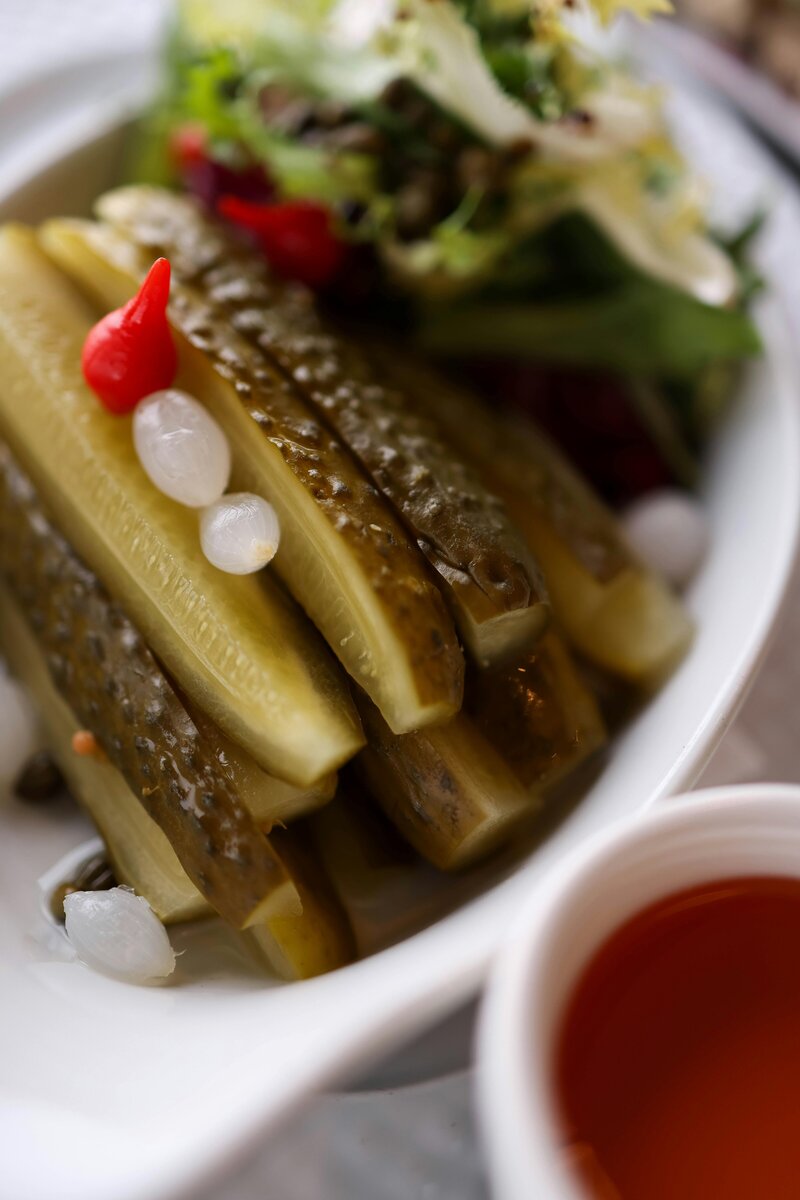 Variety of pickled vegetables including cauliflower, carrots, and celery