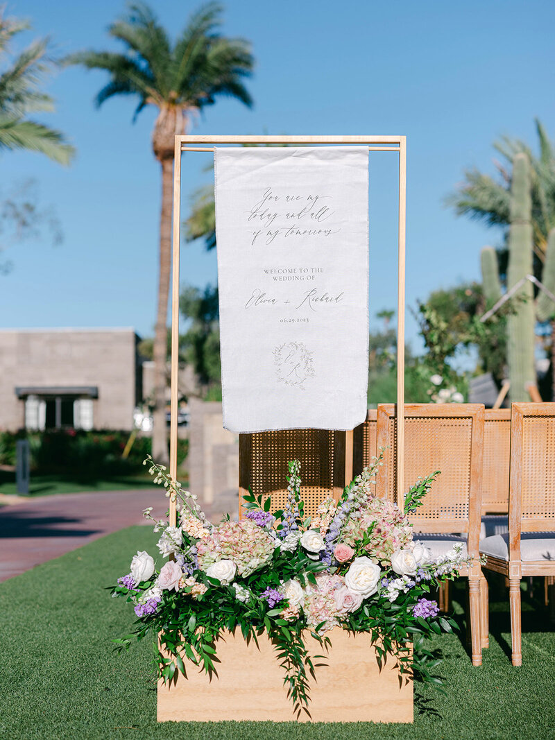 wedding ceremony linen aisle welcome sign with floral box