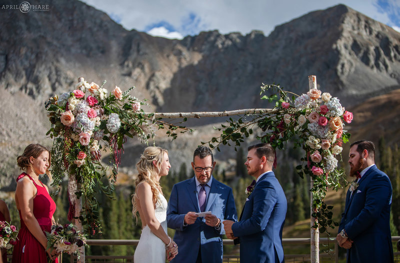 Outdoor Colorado wedding ceremony at Arapahoe Basin Resort in Keystone