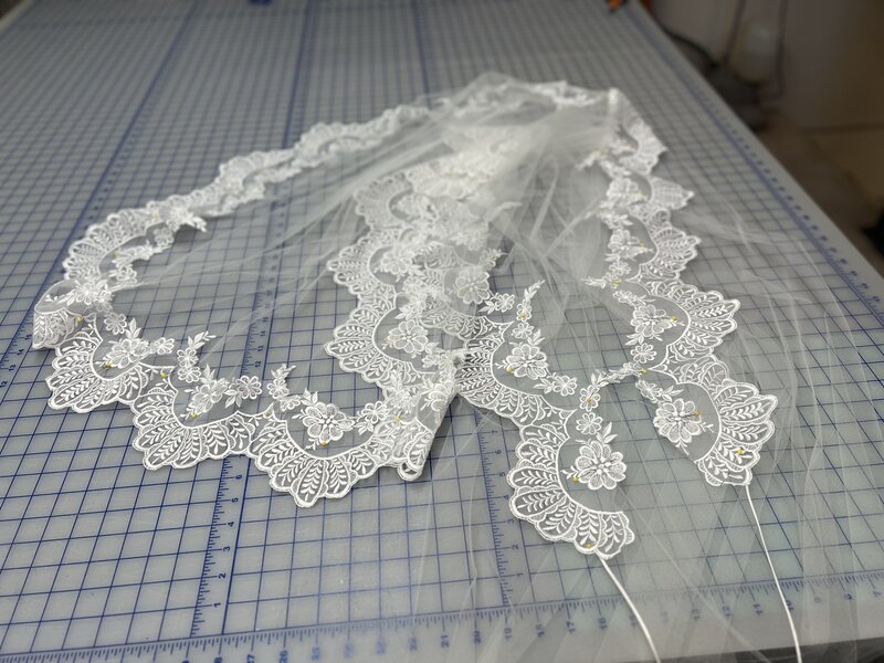 custom bridal veil made with vintage heirloom lace from a restyled gown
