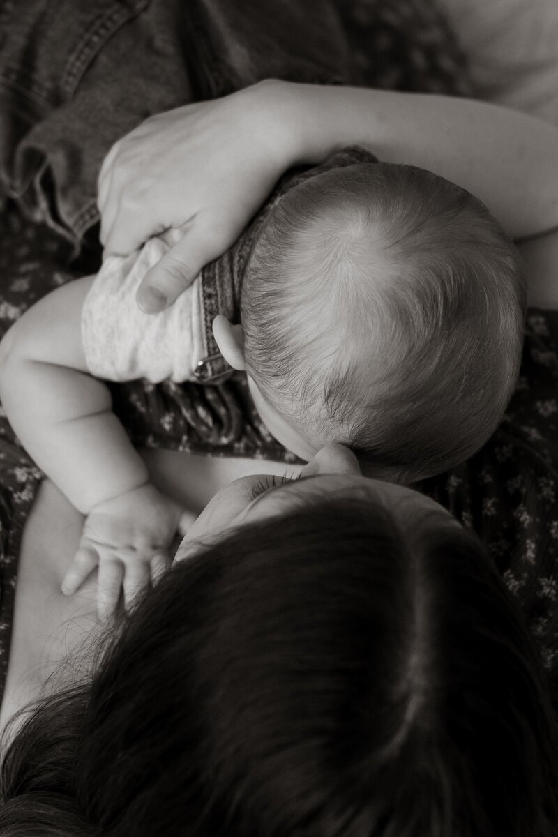 Mom giving her child a kiss