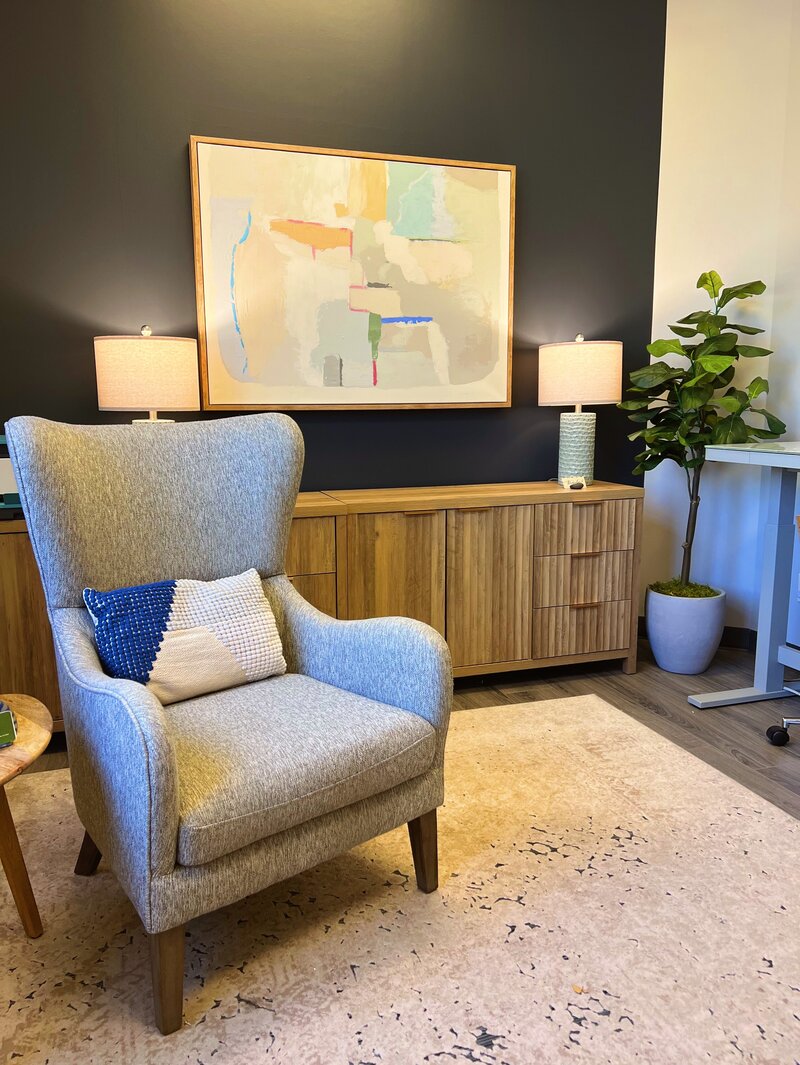 Office Image With a Chair, Table  and Artwork