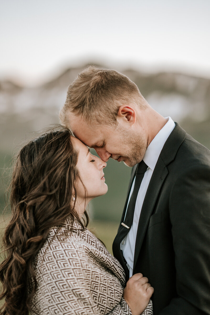 colorado elopement photographer in aspen, bride and groom embracing