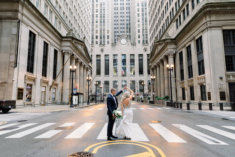 couple dancing in front of board of trade