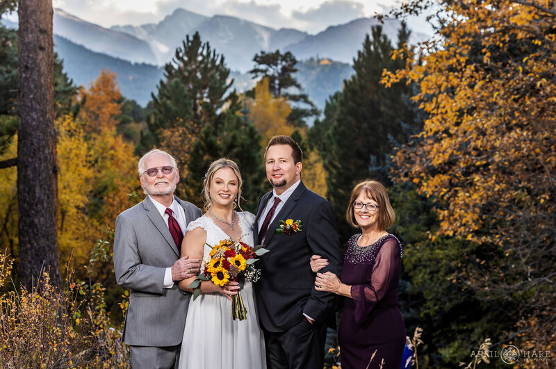 Family Photo with Mountain Backdrop at Romantic Riversong Inn Estes Park Colorado