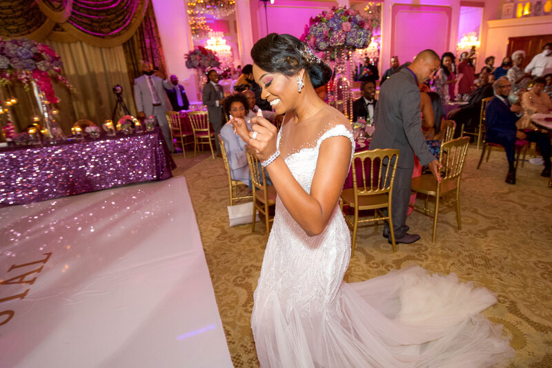 Angela, a wedding planner in Raleigh, NC, bringing warmth and expertise to seamless wedding coordination and management.