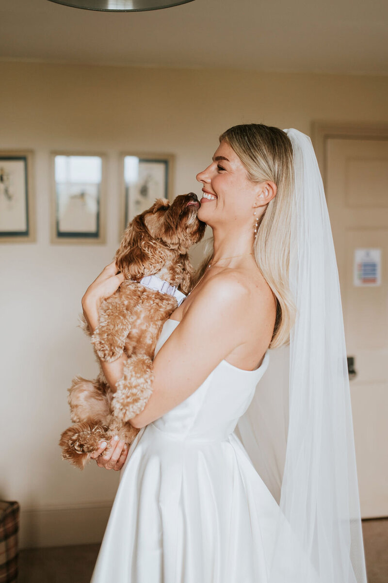 Brides dress being carried BROADFIELD COURT