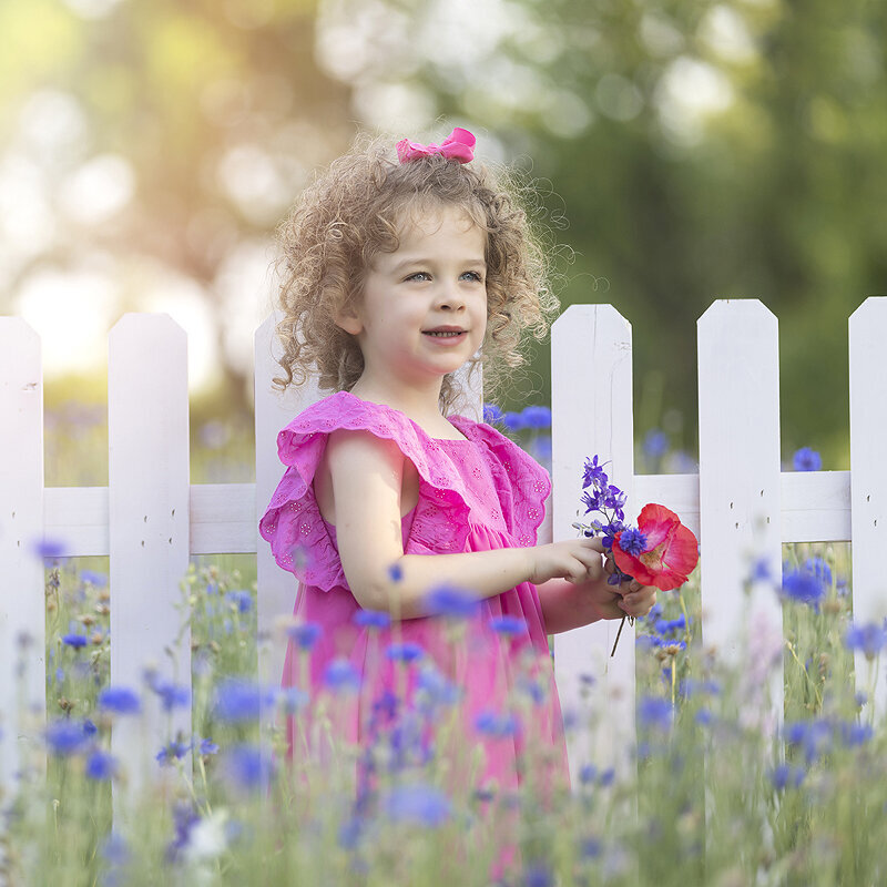 Young girl in wildflower field.