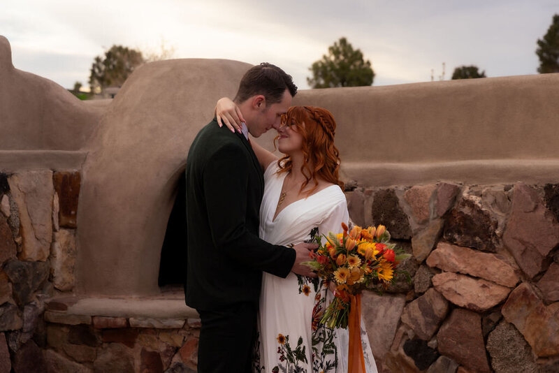 Couple eloping at a cozy casita-style venue in Utah, captured by Lamblight Photography