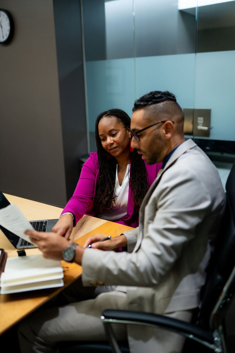 Central Ohio family law attorney sitting at desk helping client navigate child custody