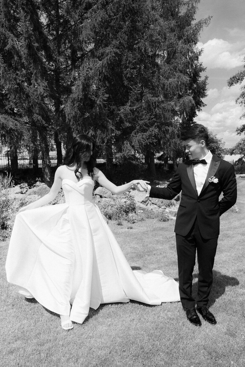 Luxury wedding in Europe – sophisticated bride in a modern wedding gown and groom in a timeless suit.