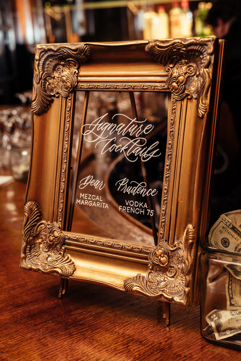 Ornate frame with signature cocktails