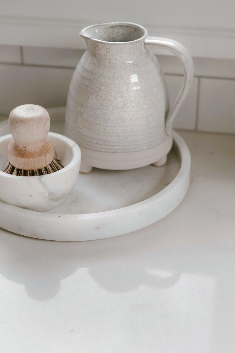 home staging details pitcher on marble tray