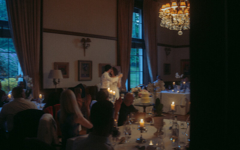 Joyful evening wedding reception filled with laughter, love, and celebration as the couple and guests enjoy an unforgettable night together