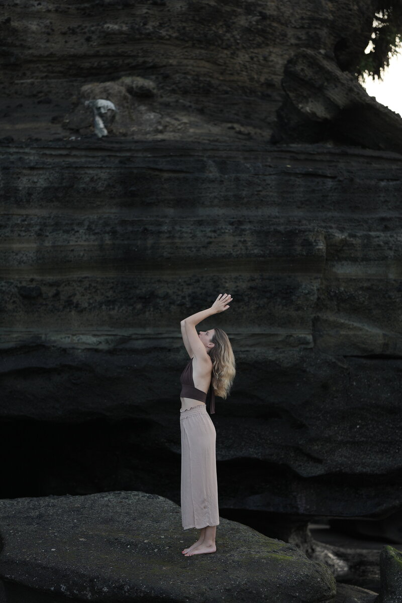 woman dancing on the beach