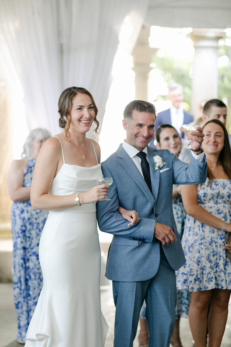 bride-groom-toasts-reception