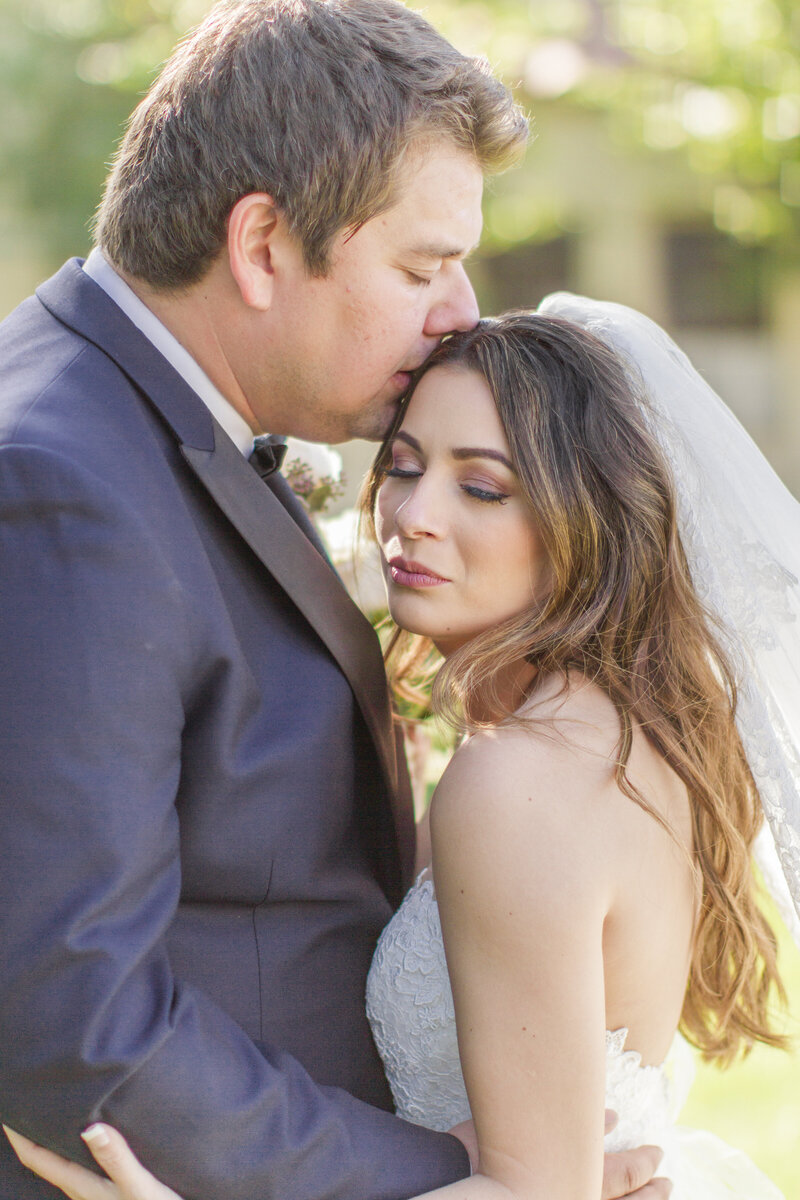 Bride and groom portrait at st. therese church