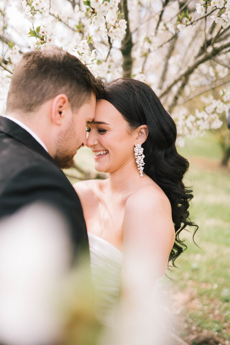 Sacramento Wedding Photographer captures couple laughing after forest wedding