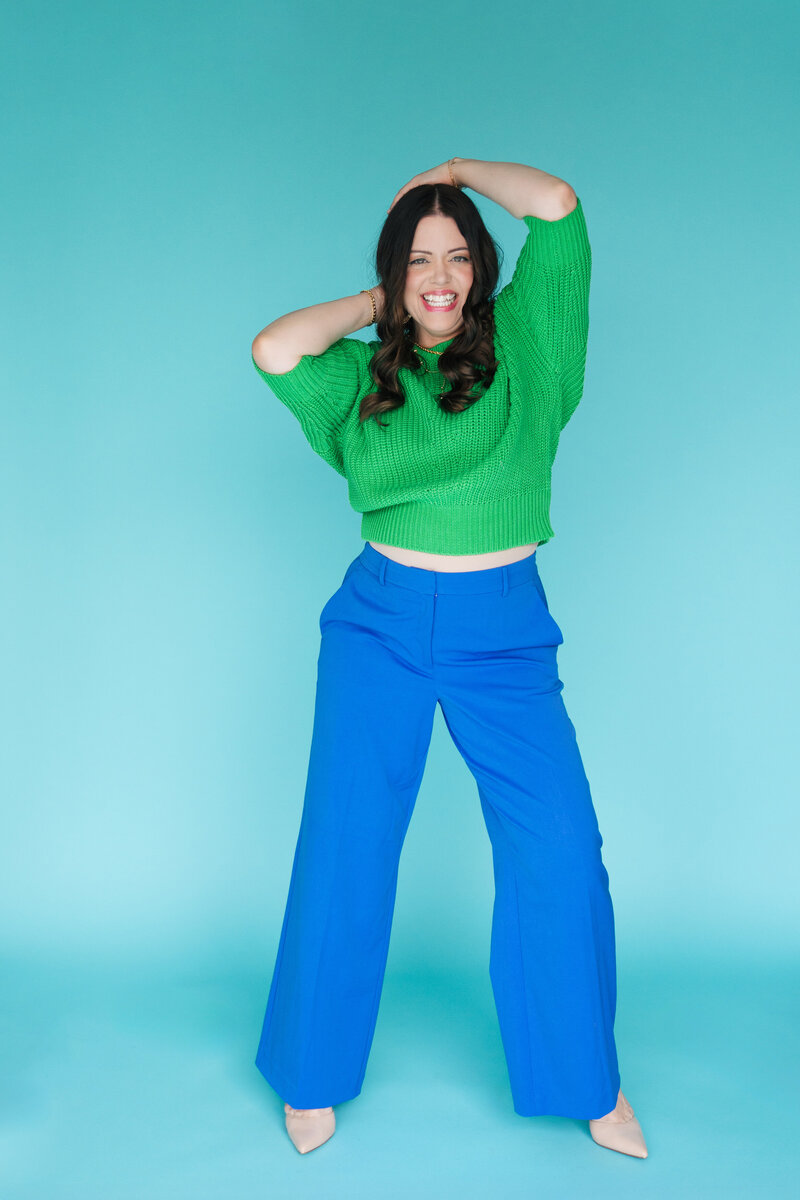heather smiling in green sweater