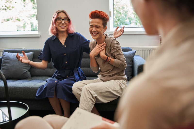 Marriage counseling of two happy partners