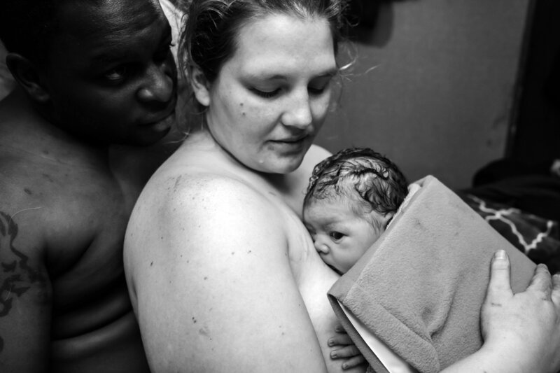 Mom and baby skin to skin after birth