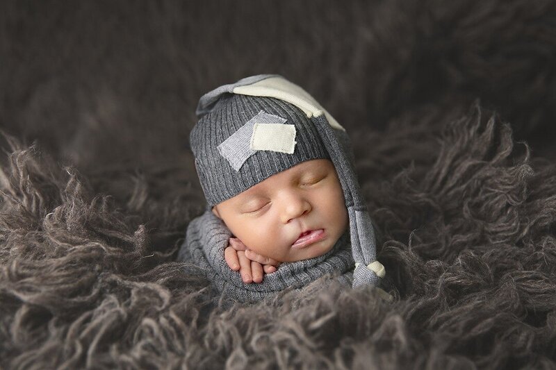 Newborn Baby in sleepy hat