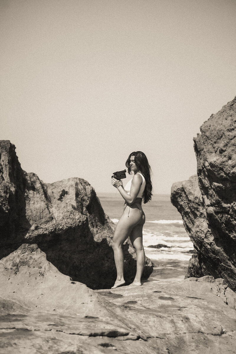 Girl holding vintage camera