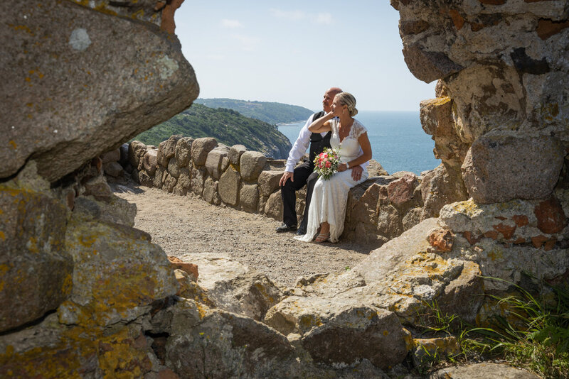 A couple at the Hammershus Ruins on Bornholm Island, a truly intimate wedding venue abroad, perfect for destination elopement
