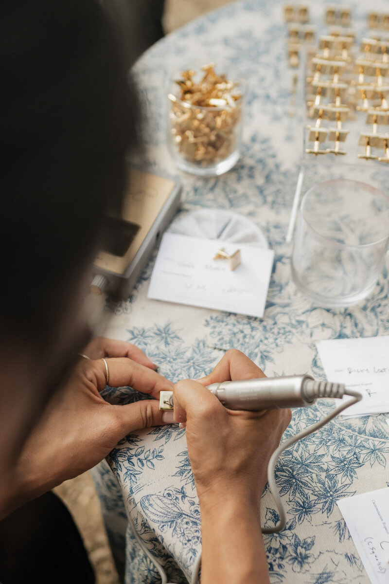 Cat Lauren Calligraphy engraving cuff links at a wedding in Paris