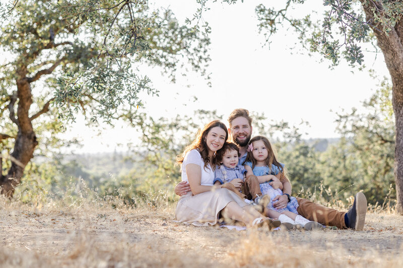 family-sitting-guadalupe-oak-grove