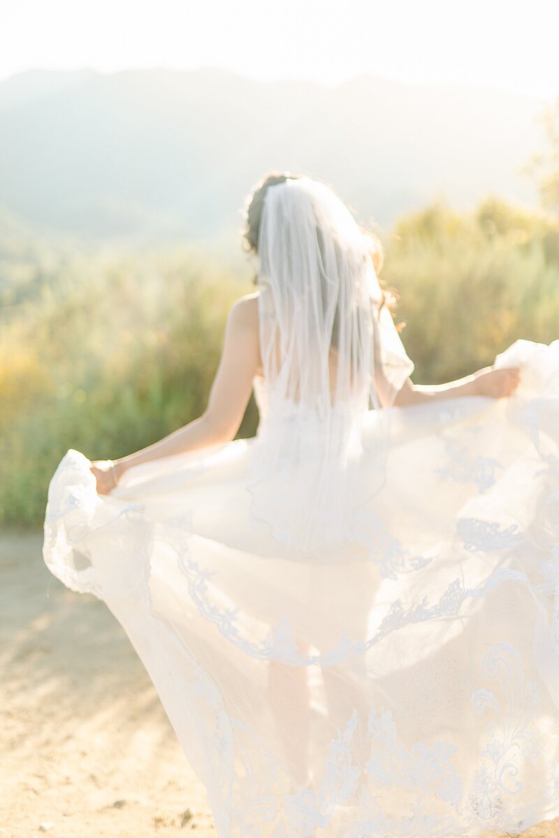 Bride running at Monserate Winery in Temecula, California