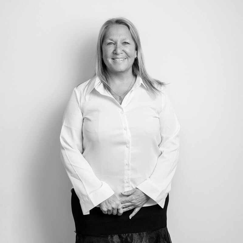 Natural black and white portrait of a woman before makeup application.
