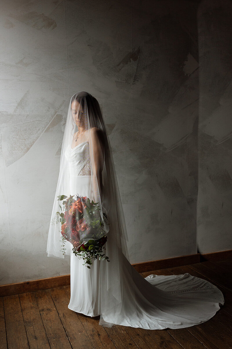 bride poses for  portraits on wedding day in lancaster pa