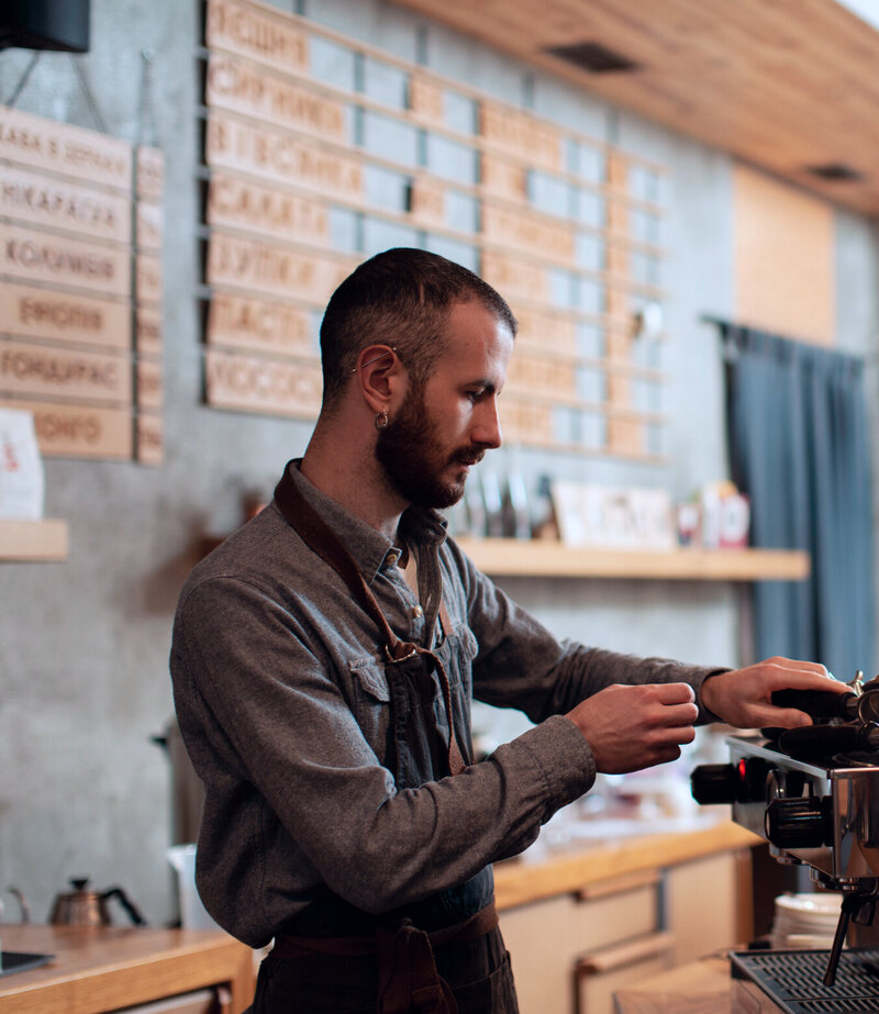 man making coffee