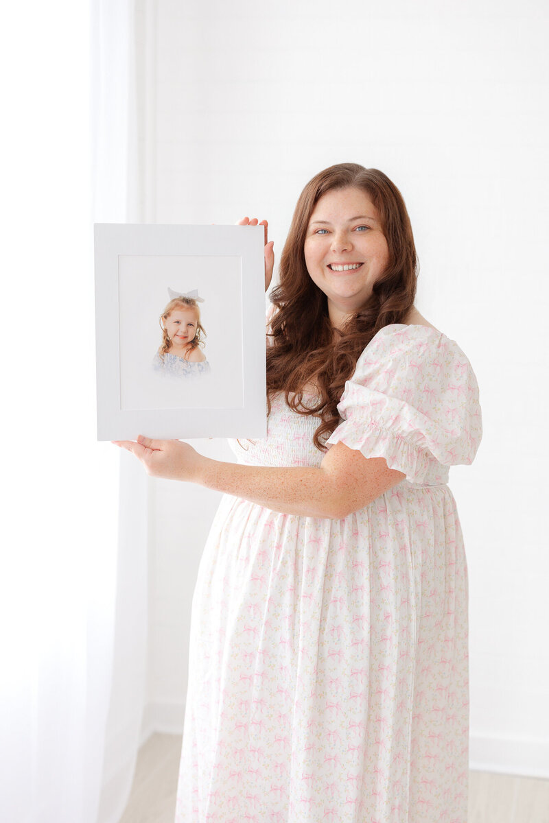 Photographer posing with daughter
