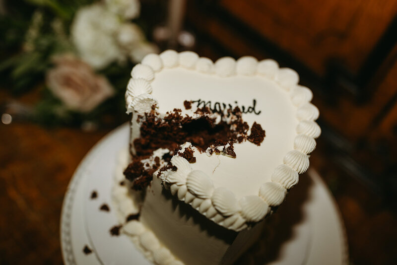 White heart-shaped wedding cake.