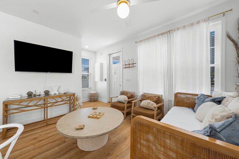 Stylish and cozy living space at Beach Cabana Panama City Beach vacation rental, near Pier Park, Thomas Drive, 30A, and Santa Rosa Beach.