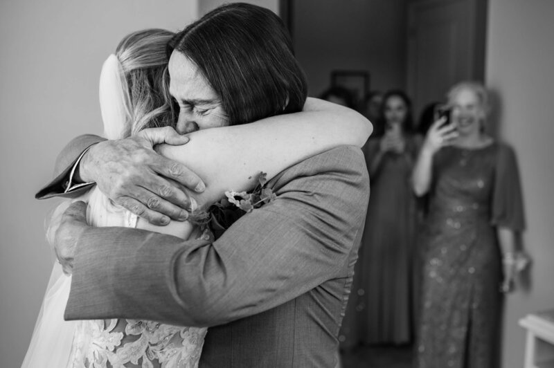 Emotional father-daughter first look during wedding