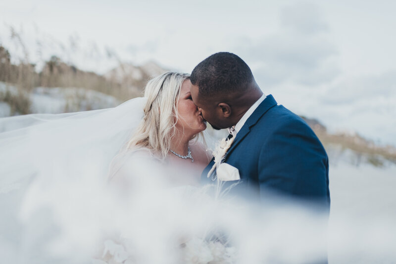 bride and groom portraits on the beach at omni resort hilton head wedding