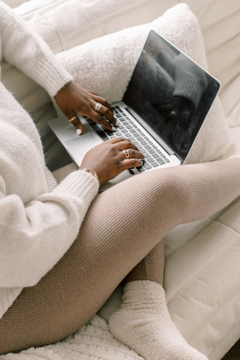 Girl typing on the laptop