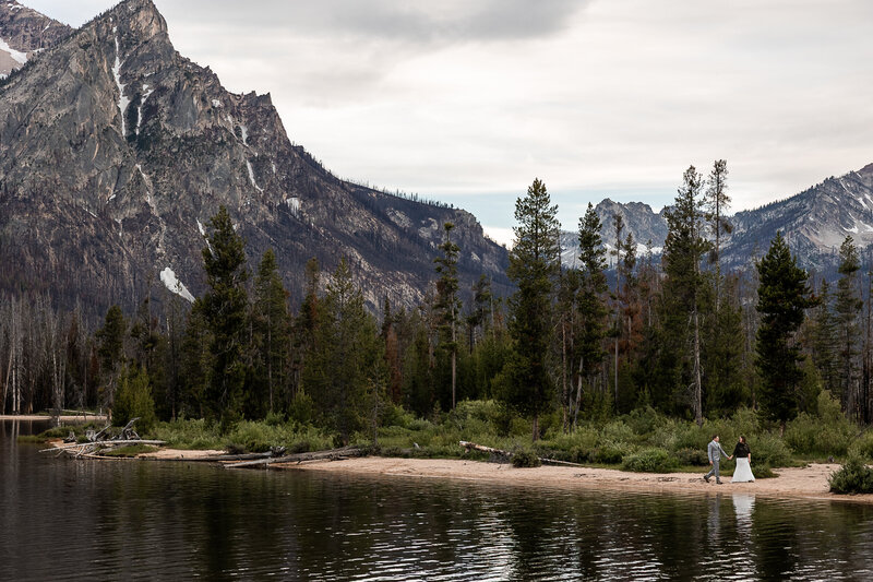Bride and Groom facing each other at Sunset at Taft Point Yosemite