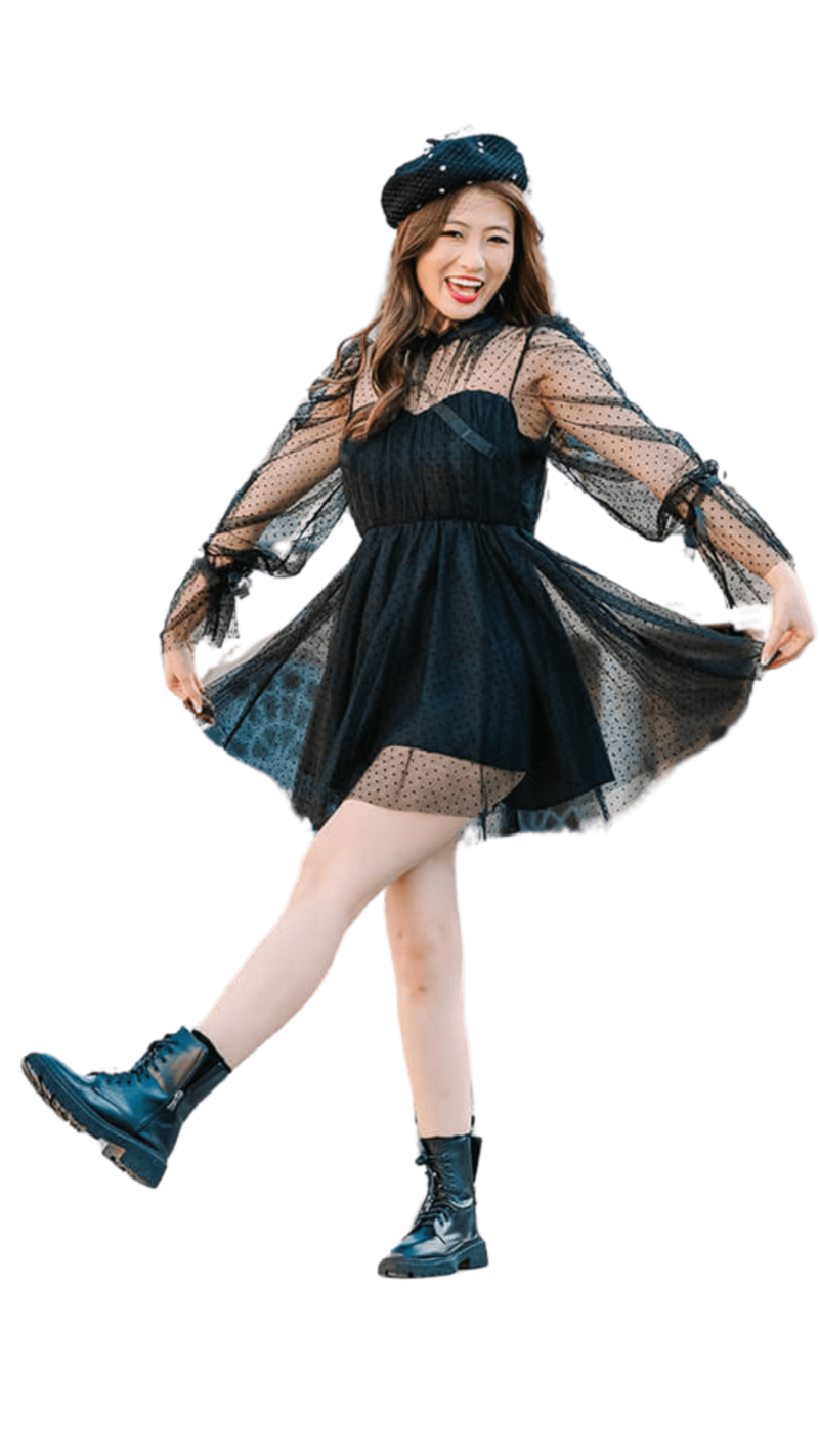 Fashionable solo traveler in a French beret and Doc Martens captured near the Eiffel Tower, Louvre, and Palais Royal during a Paris photoshoot