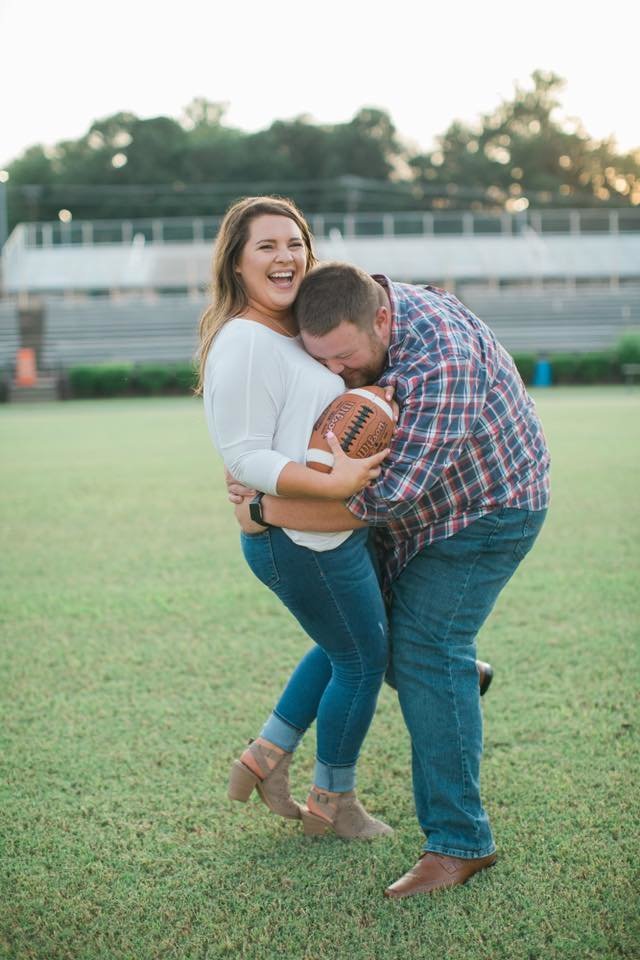 Wedding Photography, couple playing around with a football