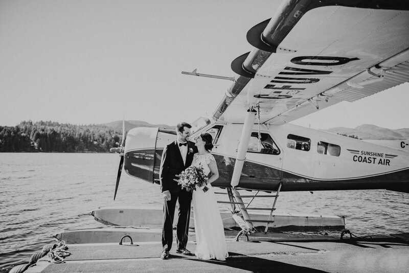Couple standing waiting to depart for their adventure elopement.