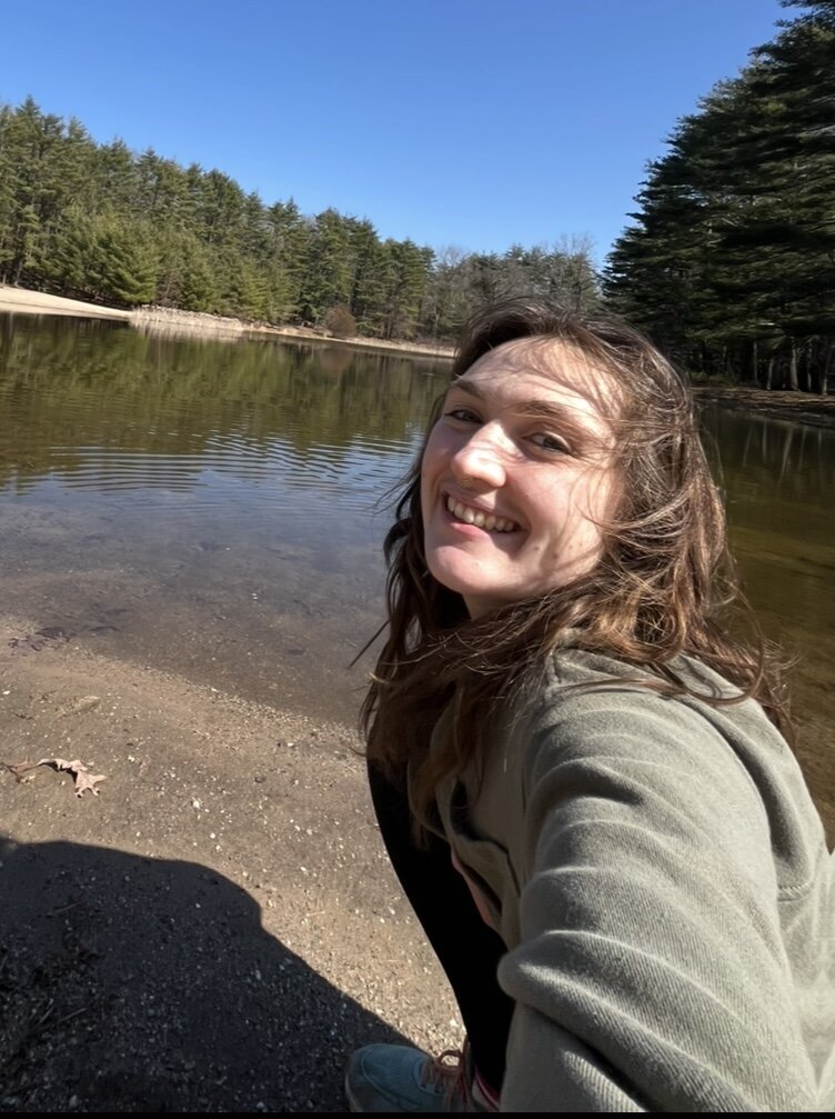 Jeannine, a playworker at Brave Nature School, engaging children in sensory play and fostering creativity through nature-based experiences.