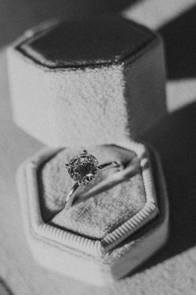 Black and white, simple, elegant engagement ring in ring box