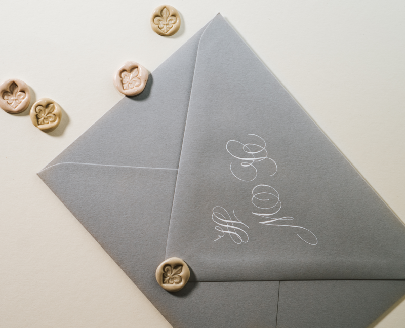 Calligraphy initials on envelope