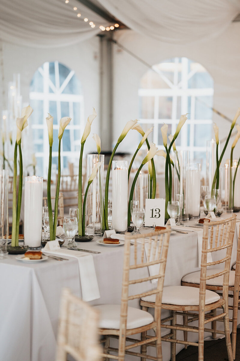 bride and groom popping champagne