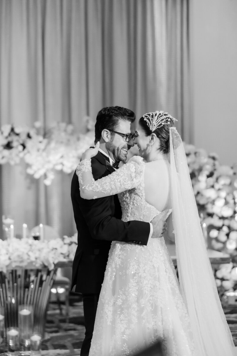 Bride and groom at their wedding reception at the four seasons Orlando by Florida wedding photographer.