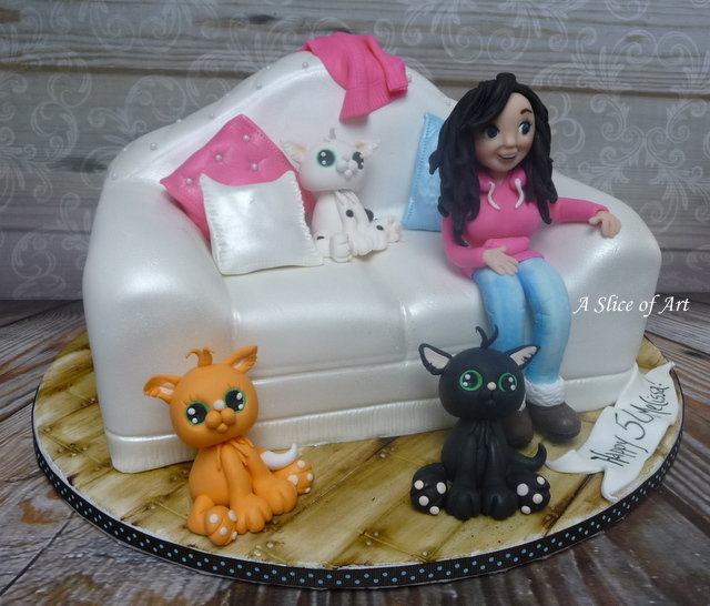 handcarved sofa cake with fondant characters